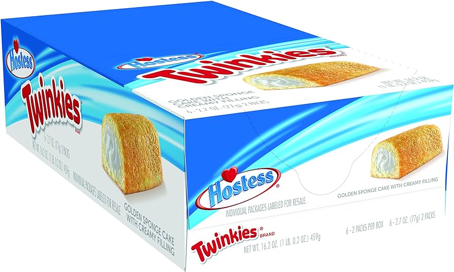 Hostess Twinkies from Sweet Cakes Shop displayed on a platter, delicious golden pastries for dessert lovers.